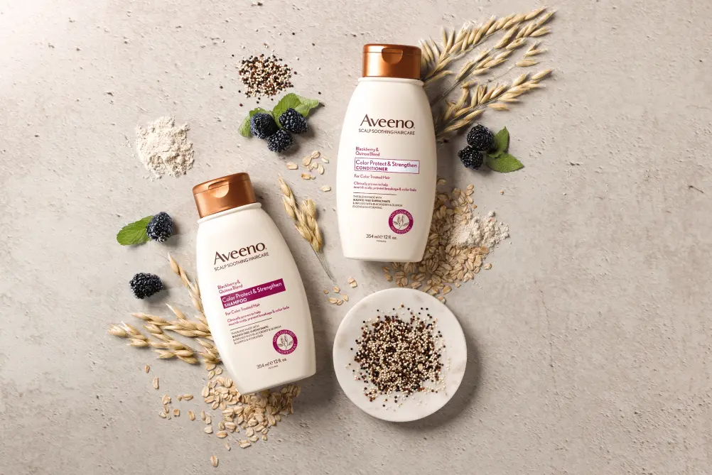 Aveeno® Color Protect & Strengthen haircare set displayed with its nourishing ingredients of colloidal oats and more