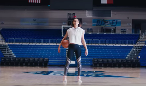 Skylar Diggins-Smith holding a basketball.