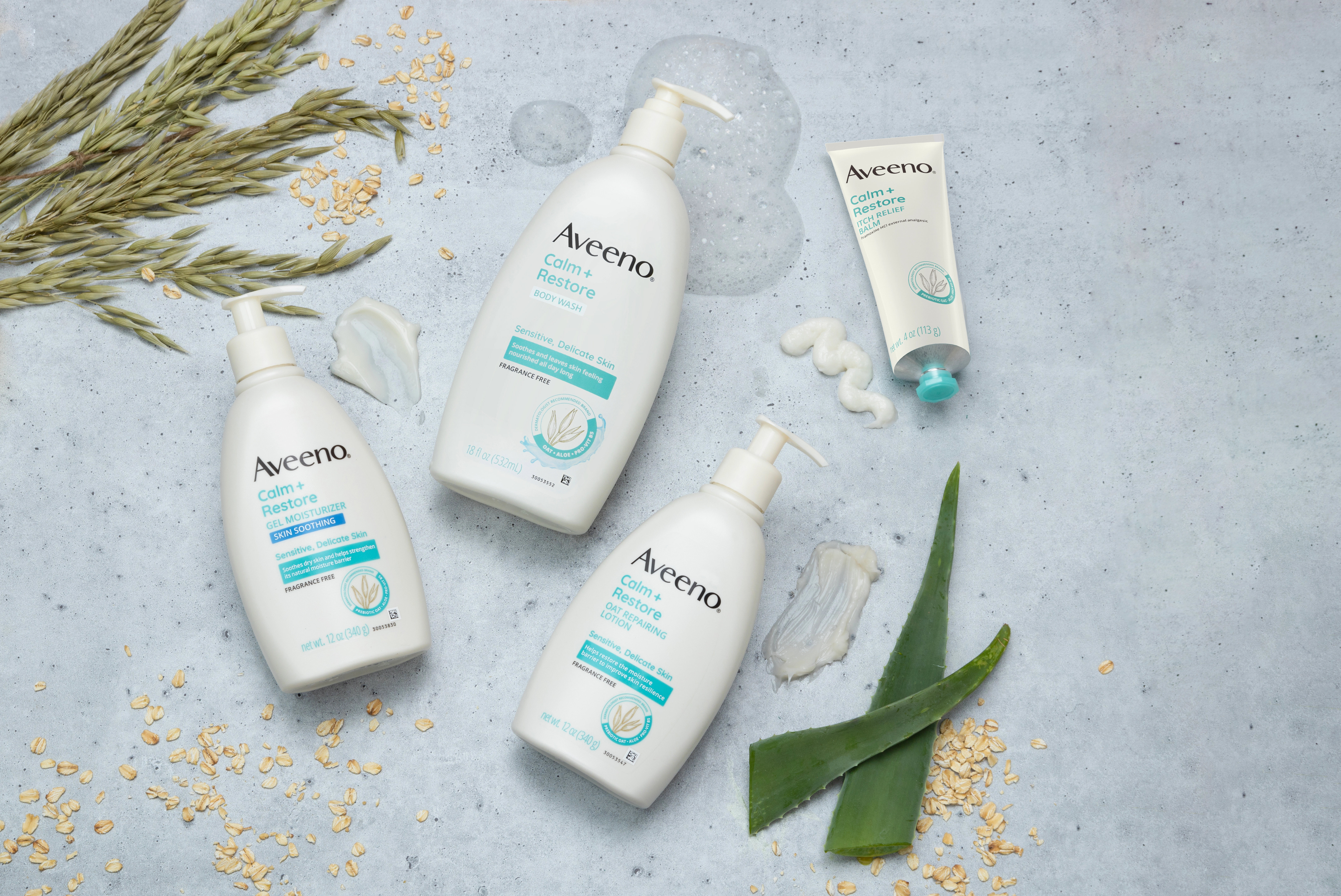 Four packages representing the Aveeno® Calm + Restore® collection