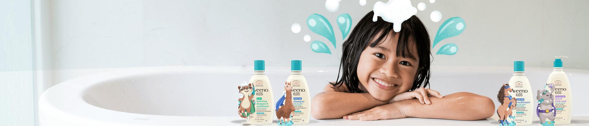 smiling kids with aveeno products