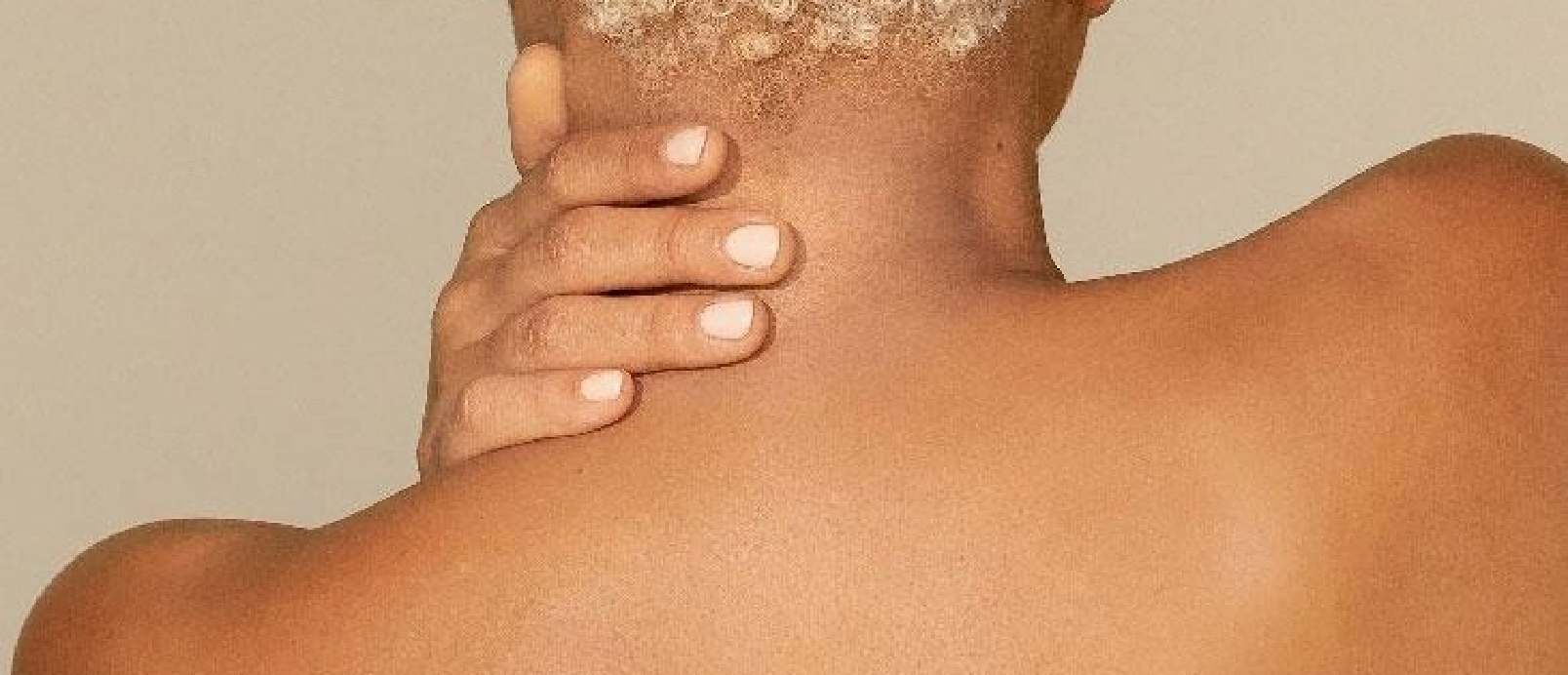 Skin Tone and Texture of Woman's Neck and Shoulders